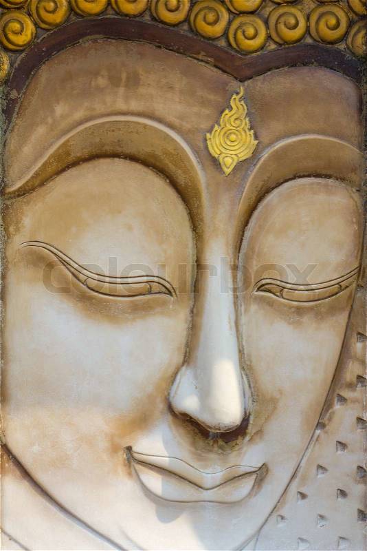 Buddha face sculpture, stock photo