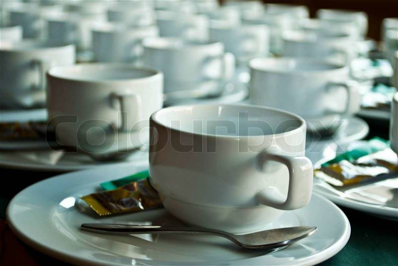 Lots of coffee in cups on the table, stock photo
