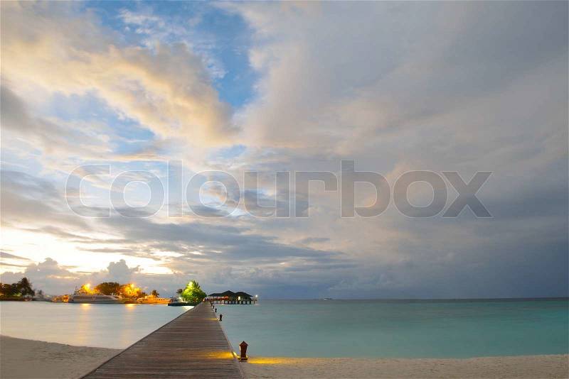 Tropical water home villas resort on Maldives island at summer vacation, stock photo