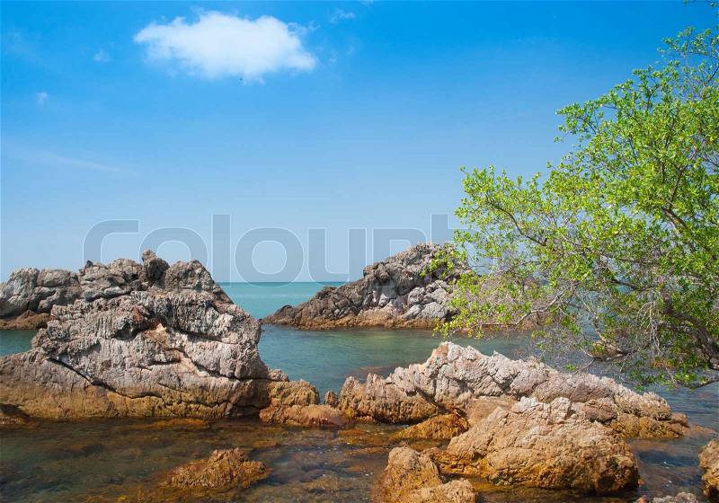 Rocks on the beach in Tropical sea at Bamboo Island Krabi Province Southeast Asia Thailand, stock photo
