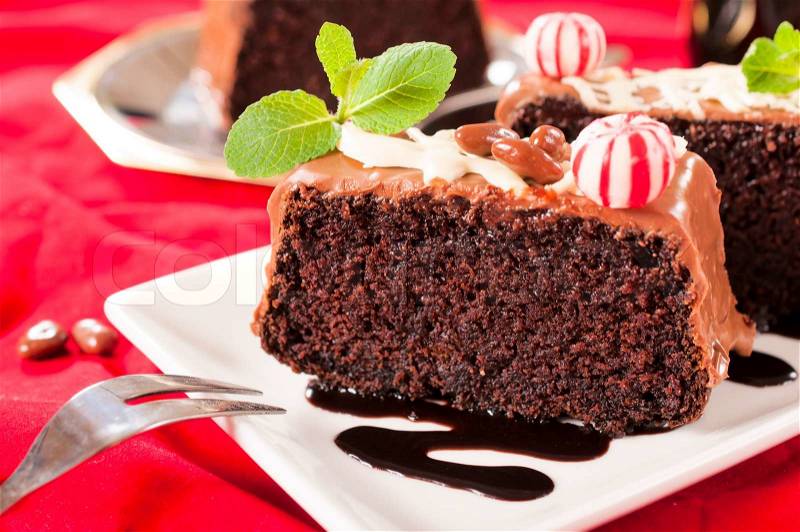 Delicious chocolate cake on the plate.selective focus on the front slice of cake , stock photo