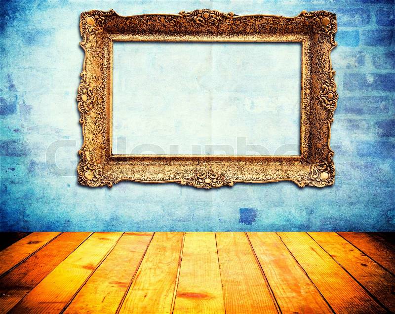 Old vintage blank frame on the abstract wall, stock photo