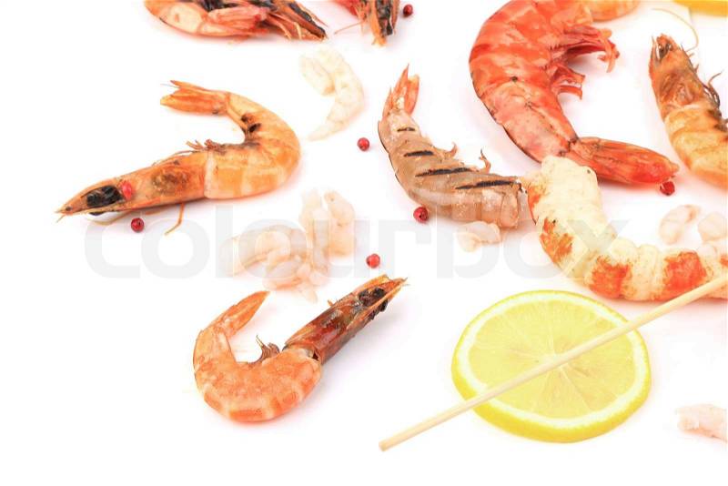 Fresh cooked shrimps composition with lemon. Whole background, stock photo