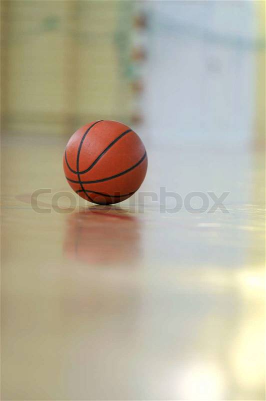 Basketball ball indoor at school and gym, stock photo