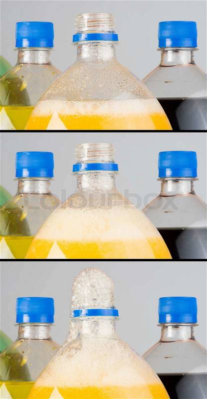 Carbonated drinks in plastic bottles. Multicolored drinks. Studio shot, stock photo