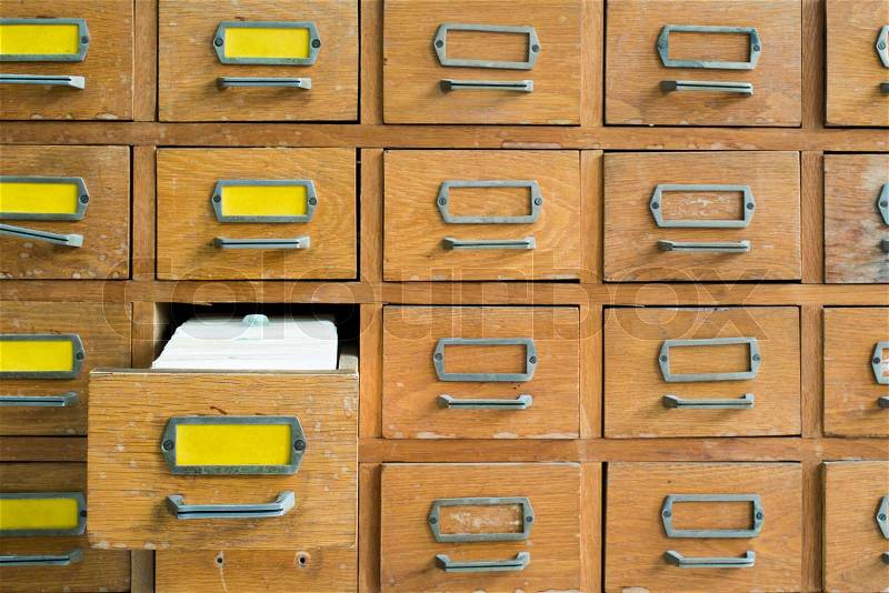 Old archive with wooden drawers, stock photo