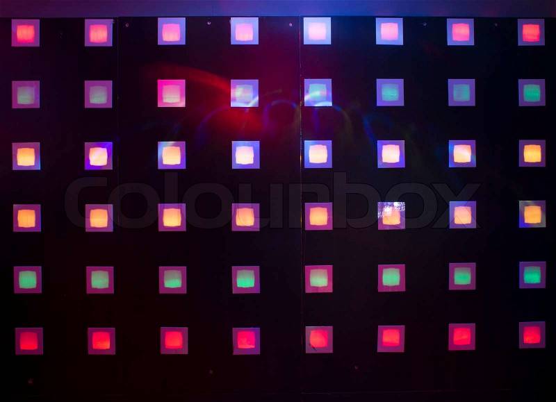 Disco with colorful lights. Dancing, stock photo