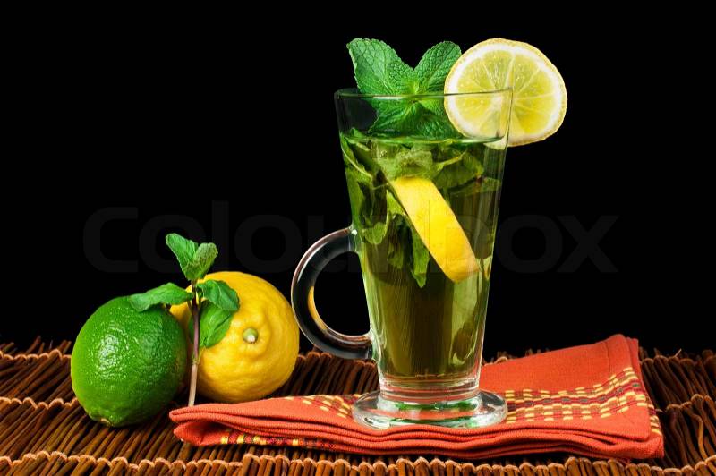 Cup of mint tea. Mint tea with lemon and fresh mint, stock photo