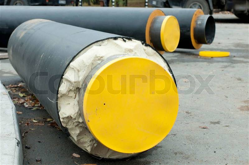 Pipes for hot water and steam heating. City heat pipeline, stock photo