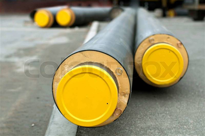 Pipes for hot water and steam heating. City heat pipeline, stock photo