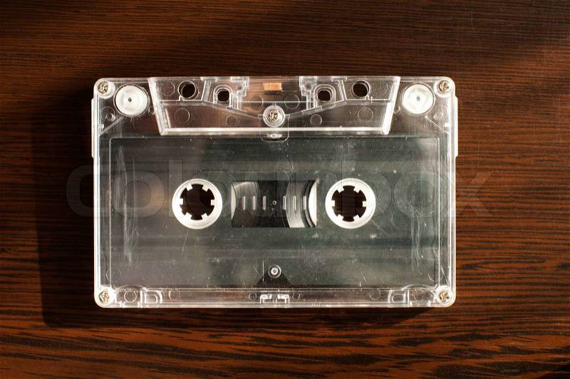 Audio tape cassette. Wooden background , stock photo