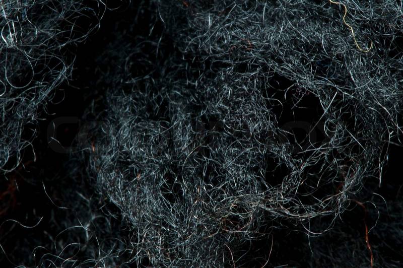 Black wool fibers closeup, stock photo