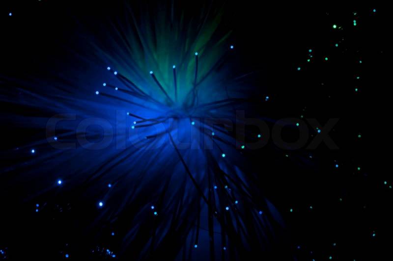 Optical fibers of fiber optic cable. Internet technology.Blue color, stock photo