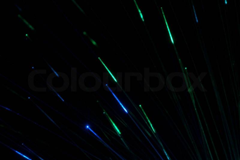 Optical fibers of fiber optic cable. Internet technology.Blue color, stock photo
