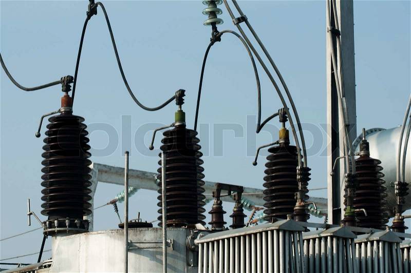 High-voltage wires and transformers. Electrical distribution station, stock photo