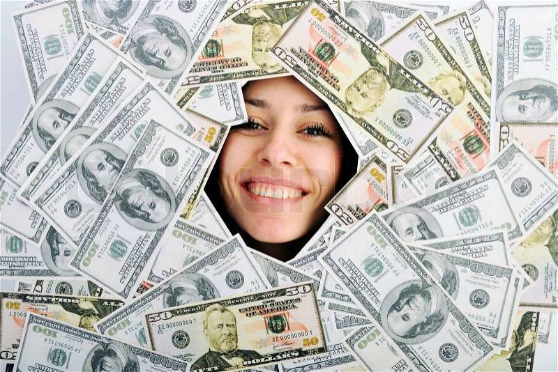 Happy young business woman isolated on white playing with dollars money and representing success in finance, stock photo