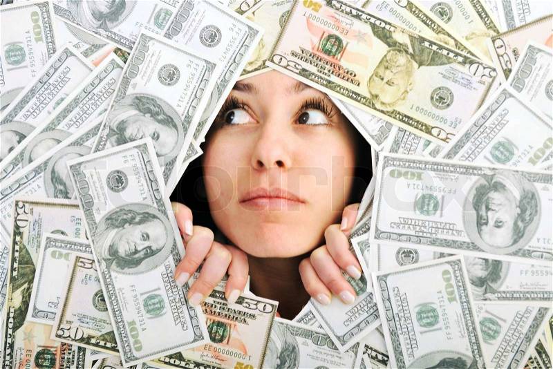 Happy young business woman isolated on white playing with dollars money and representing success in finance, stock photo