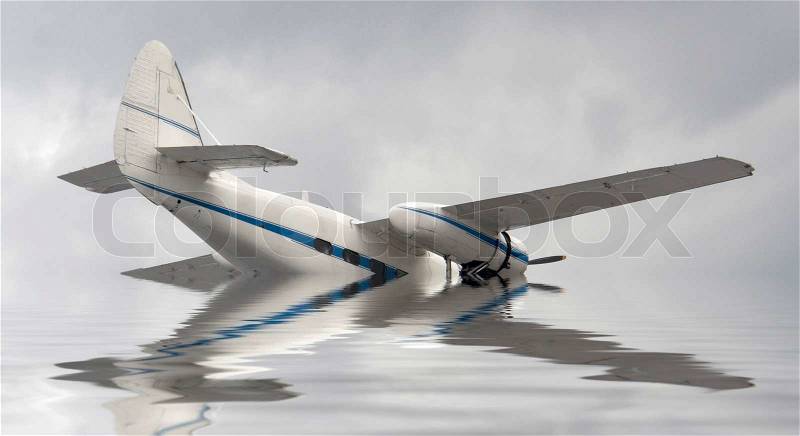 Plane crash with small propeller aircraft in reflective water ambiance, stock photo