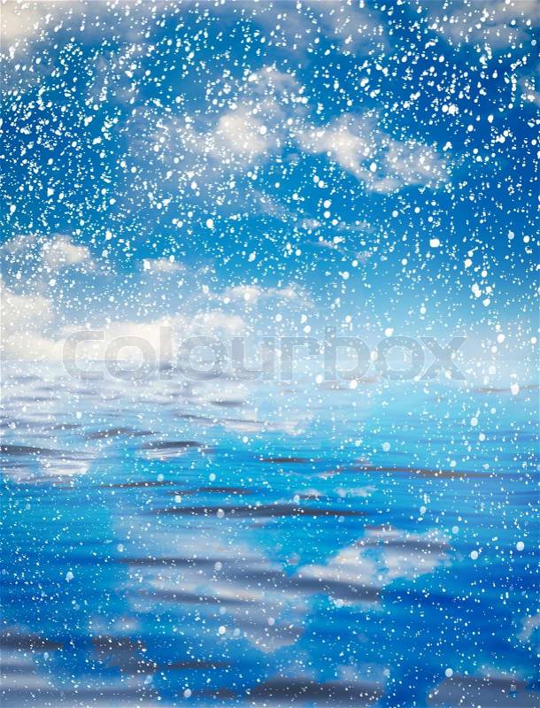 Snowing at sea with a beautiful sky. beautiful background, stock photo