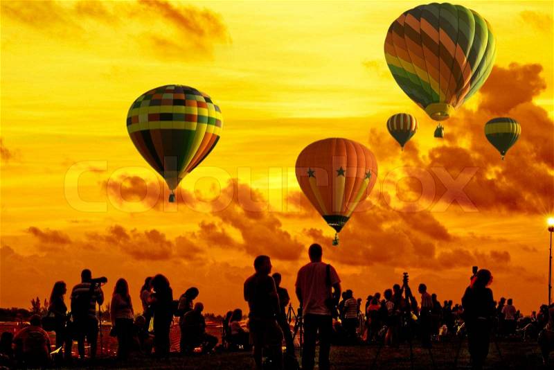 Silhouette of people watching Sunrise Hot Air Balloon Race, Miami, Miami-Dade County, Florida, USA, stock photo