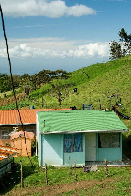 A small house on the hill in the countryside of Costa Rica, stock photo