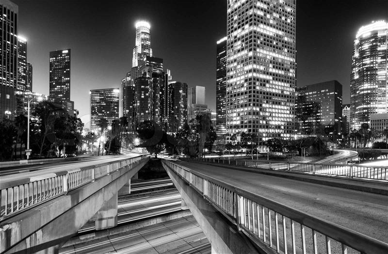 Downtown skylines lit up at night, Los Angeles, California, USA, stock photo