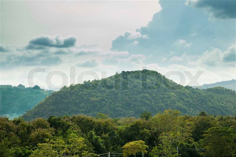 Forests, mountains and sky Mountains with forest covered intensively. Sky and Cloud Cover, stock photo