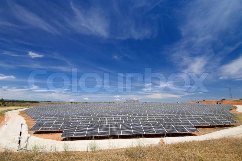 View of a huge solar field for renewable electric energy production, Soria, Spain, stock photo