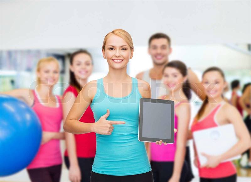 Sport, excercise, technology, internet and healthcare - sporty woman with tablet pc blank screen, stock photo