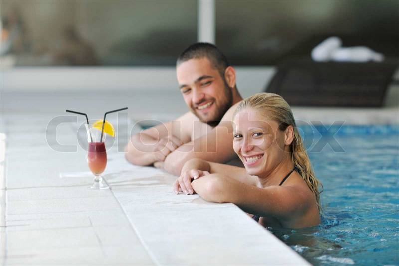 Happy young couple on wellness and spa beauty treatment in bath and bed, stock photo