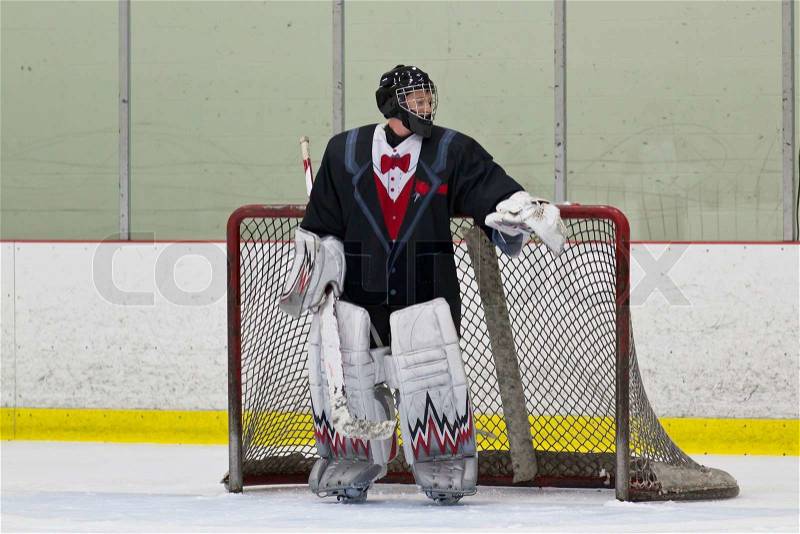 Hockey goalie in his net, stock photo