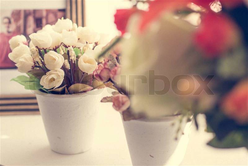 Beautiful fake flowers,vintage style, stock photo