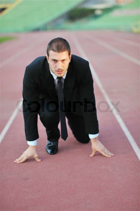 Business man sport manager and executive at soccer ball athletic stadium and race track, stock photo
