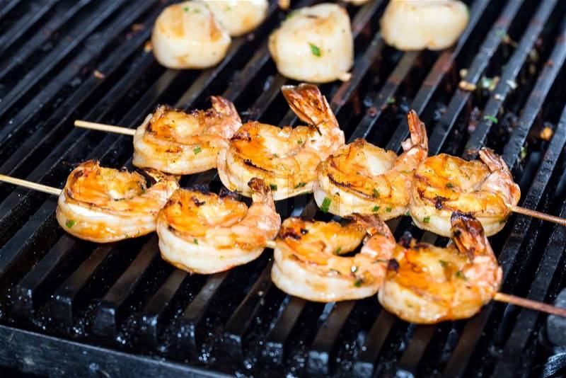Restaurant cooking shrimp on the grill, stock photo