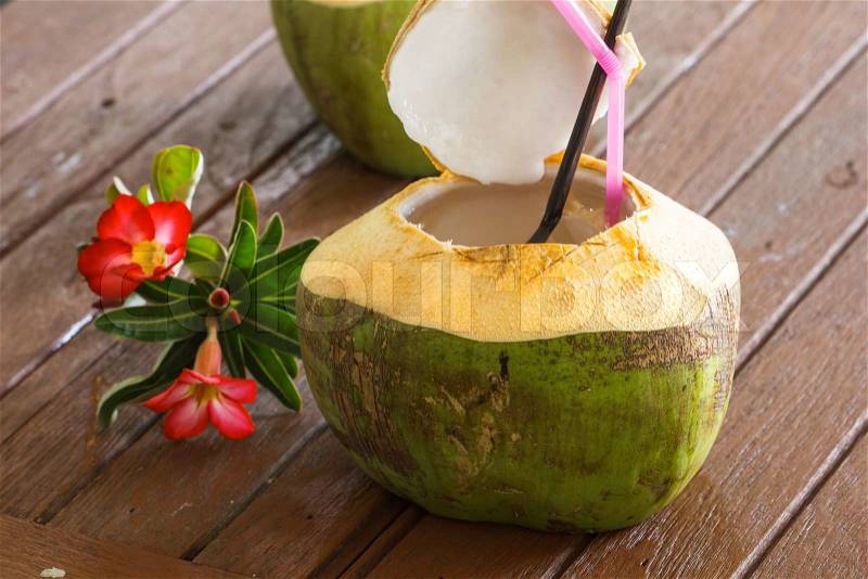 Coconut water is placed on the table and refreshment, stock photo
