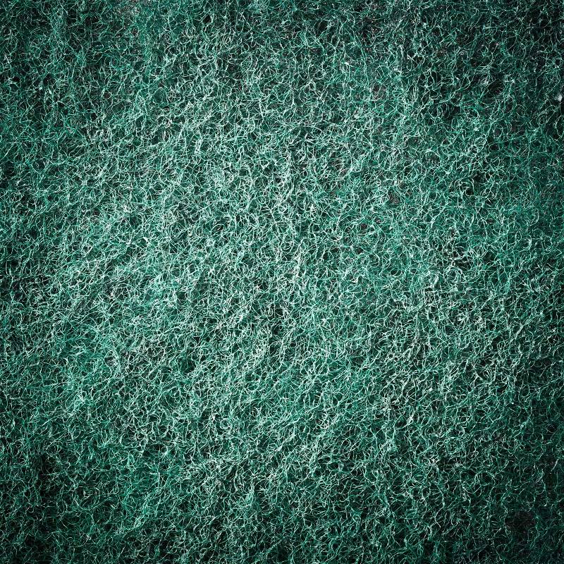 Close up Vignette style green cleaning pad texture background, stock photo