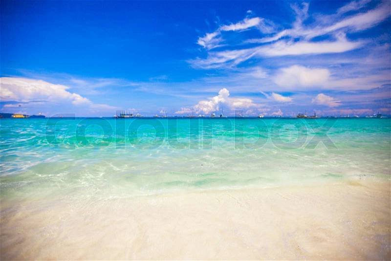 Ideal tropical beach with turquoise water and white sand, stock photo
