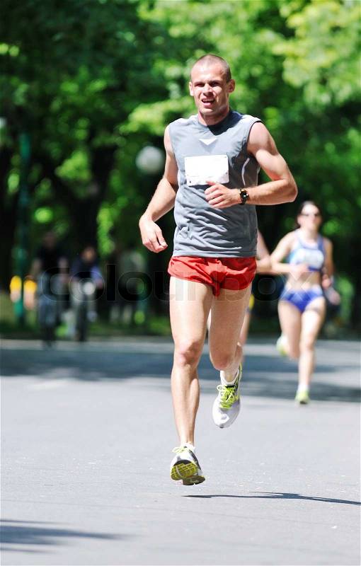 Young man run marathon and recreating fitness sport, stock photo