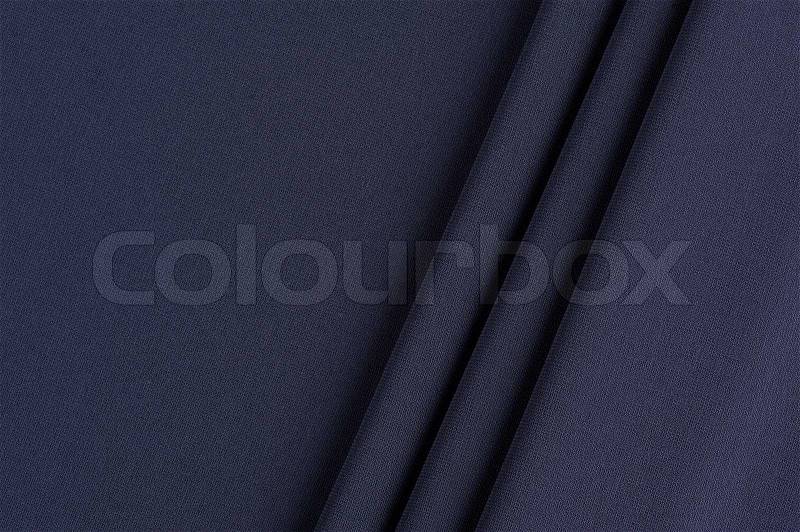 Gray cloth with straight folds texture closeup, stock photo