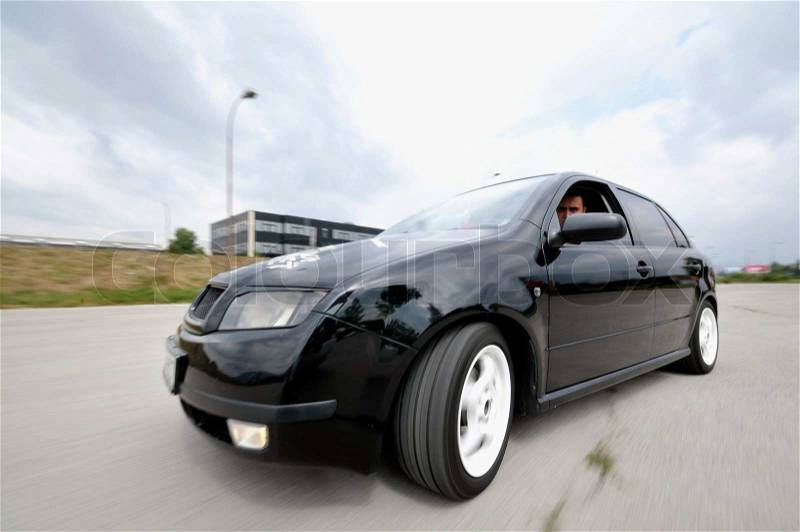 Fast car moving with motion blur, stock photo
