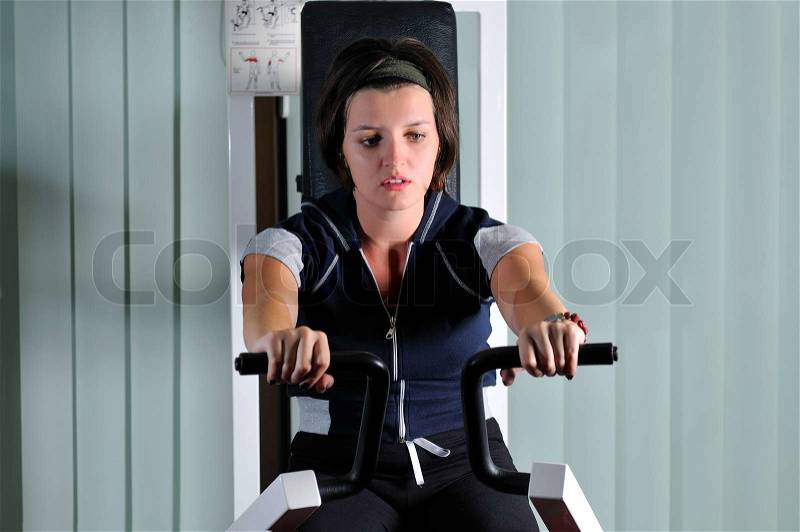 Young healthy woman work out in fitness, stock photo