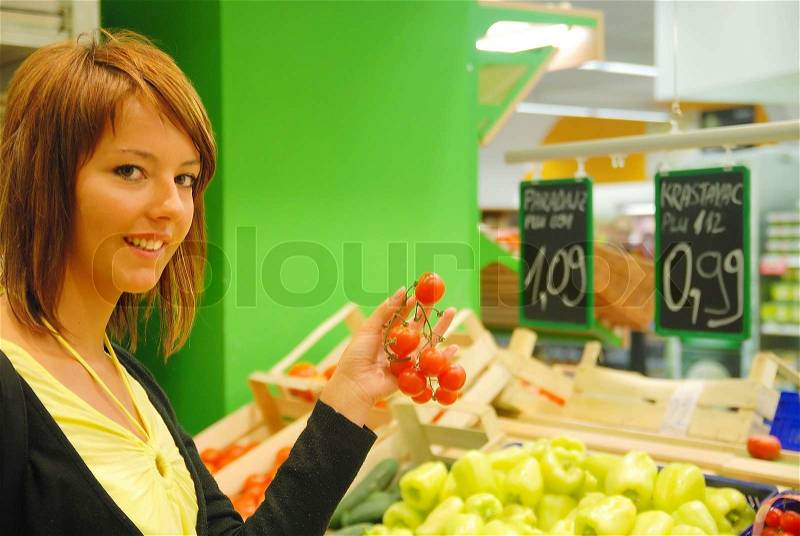Happy customer in hypermarket, stock photo
