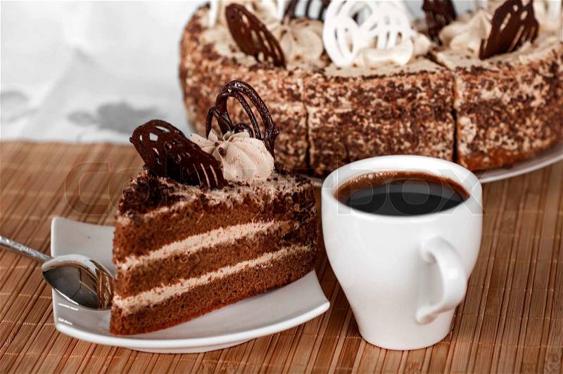 Coffee ,a slice of cake on the plate on the background of cake, stock photo