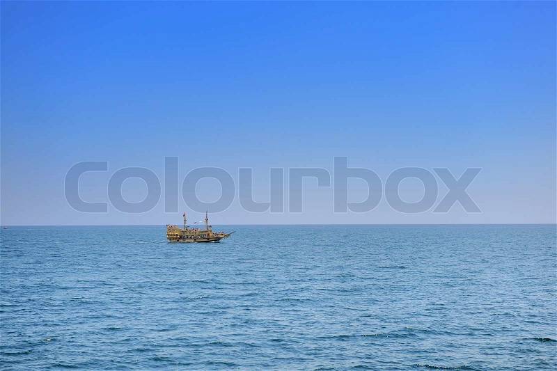 Tourist pirate boat ship sail on sea ocean, stock photo