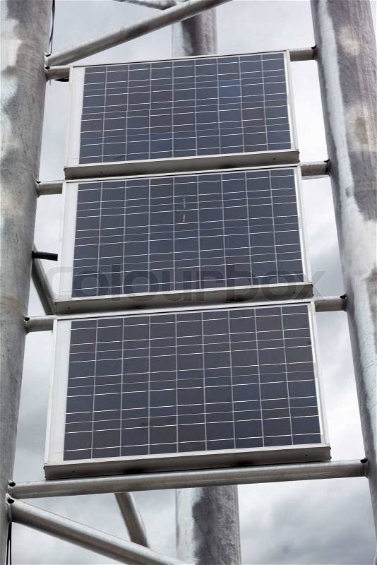 Solar battery panels mounted on metal frame, stock photo