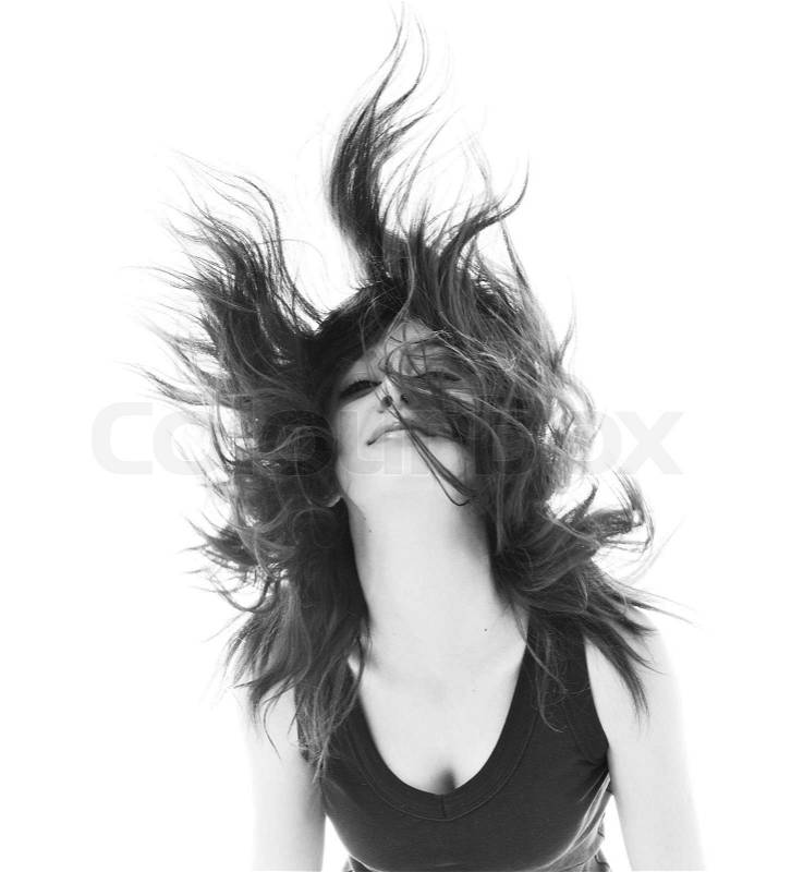 Young beauty happy party woman dance with wind in hair isolated, stock photo