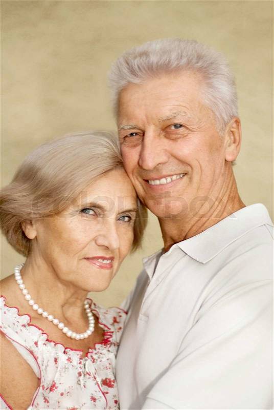 Attractive elderly couple went for a walk around the city together, stock photo