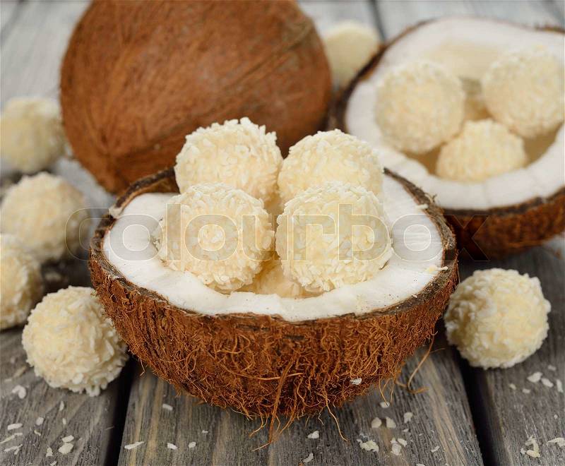Coconut candy on a gray background closeup, stock photo