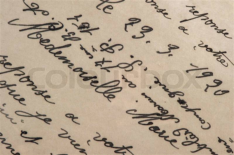 Vintage handwriting with a text in undefined language. grunge paper background, stock photo
