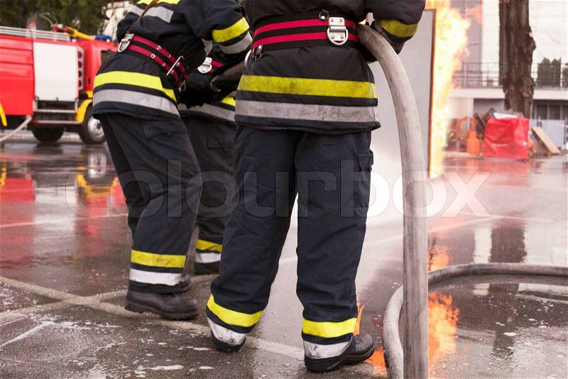 Firefighters training, stock photo